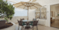 Private patio with shaded seating