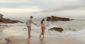 Couple walking on Laguna Beach